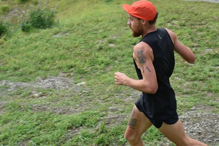 Jeff Cuno running on a trail